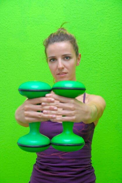 Premium Photo | Fitness training with dumbbell