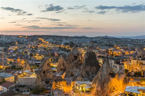 Goreme Town in Cappadocia at Sunset Stock Image - Image of pillars ...