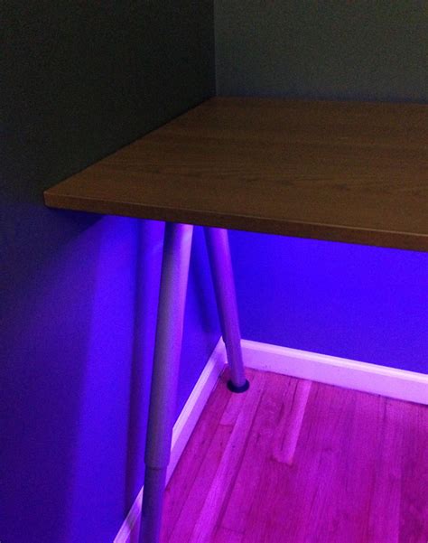 DIODER LEDs from IKEA - Neat idea to place lights under the desk. Hmmm...