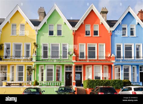 Row of brightly painted multicoloured houses in Whitehead, Northern Ireland Stock Photo - Alamy