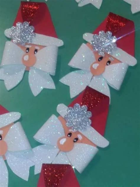 christmas decorations made to look like santas with red and white bows on their heads