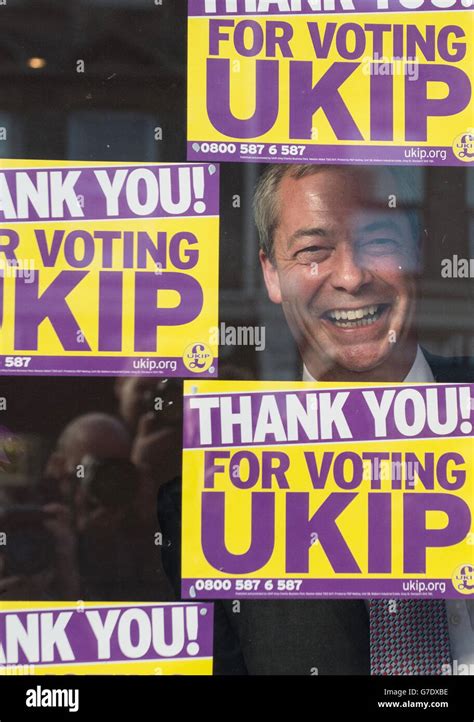 UKIP leader Nigel Farage looks out of the window of the UKIP campaign ...