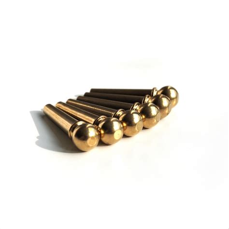 Vintage Brass Acoustic Guitar Bridge Pins | Guitar Anatomy