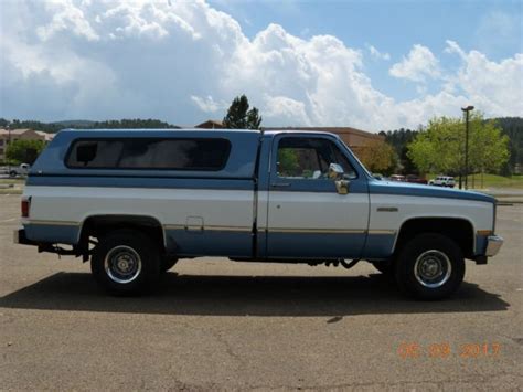 Chevy Silverado 4x4 with Camper shell.