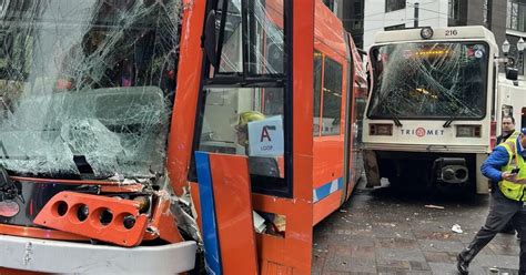 MAX and streetcar crash in Northeast Portland, derailing cars, pinning driver | News ...