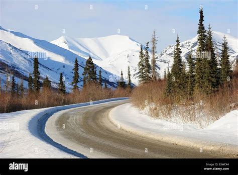 The Dalton Highway crosses the Brooks Range in the Arctic winter ...