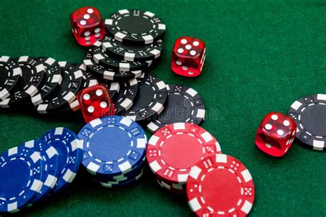 Poker Chips and Dice on a Green Gaming Table Top View Copyspace Close Up Stock Photo - Image of ...