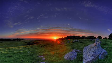 Sunset over a grassy meadow, rocks, sunset, grass, meadow, HD wallpaper | Peakpx