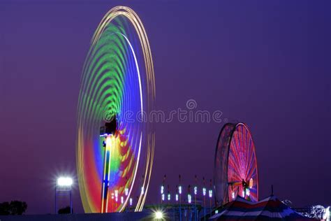 Rides at Fair or Carnival at Night Stock Photo - Image of background, festival: 255882486