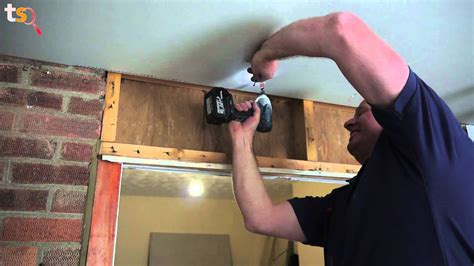 Tommy's Trade Secrets - How to Plasterboard a Ceiling - YouTube