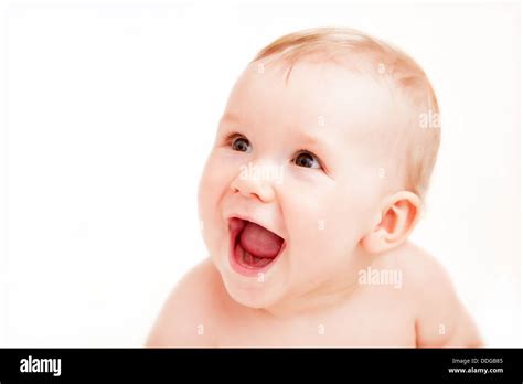 Excited baby with laughing face Stock Photo - Alamy