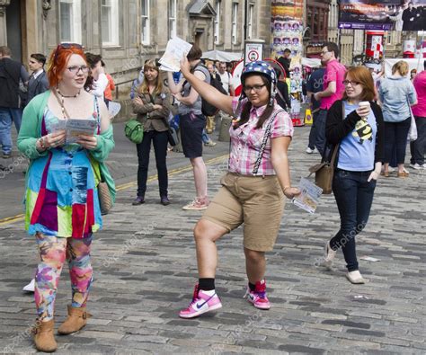 Girls handing out flyers at Edinburgh Festival – Stock Editorial Photo ...