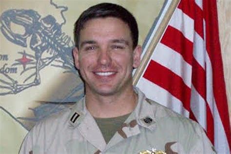 Ron DeSantis looks unrecognizable in Navy uniform photo as Florida ...