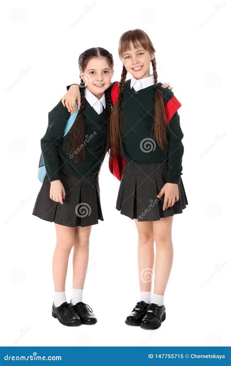 Full Length Portrait of Cute Girls in School Uniform with Backpacks on ...