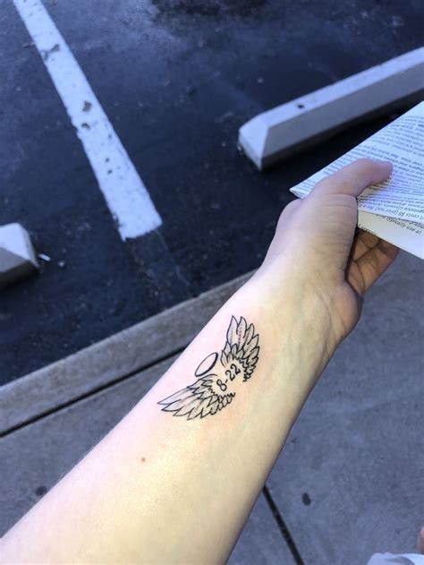 small wrist tattoo; angel in 2020 | Small wrist tattoos, Angel wings tattoo, Small angel wing tattoo