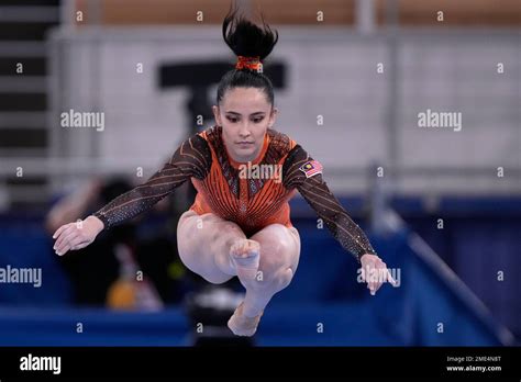 Farah Ann Abdul Hadi, of Malaysia, performs on the balance beam during the women's artistic ...