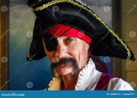 Pirate with an Eye Patch and One Piercing Eye Looks Intesly at T Stock Image - Image of pirate ...