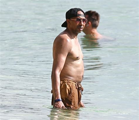 Stephen A. Smith hits the beach with female companion on trip