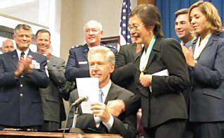 File:Davis signs bill.jpg - Wikimedia Commons