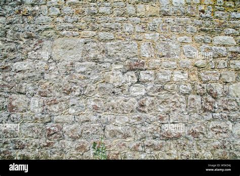 Ancient stone wall texture background Stock Photo - Alamy