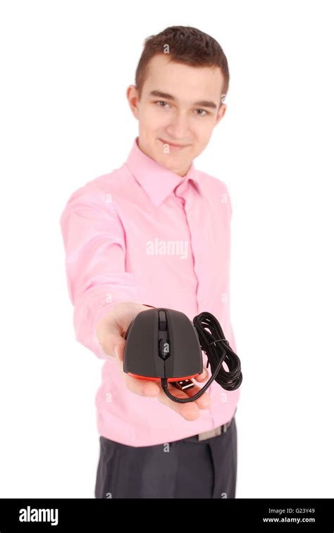 Young man holds in his hand black computer optical mouse isolated on white background soft focus ...