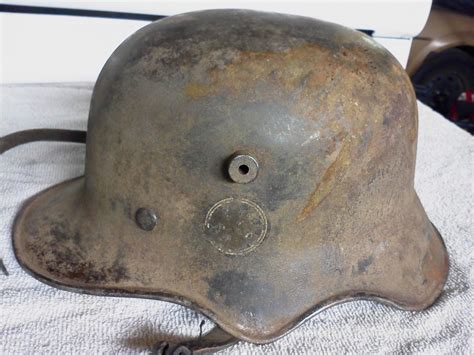 Question M1918 Cut-out helmet with early runes