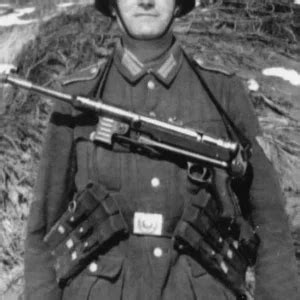 German soldier with MP40 SMG | MilitaryImages.Net