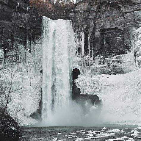 Winter cliff side waterfall 1233417 Stock Photo at Vecteezy