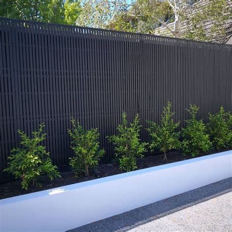 black fence ideas 10 | Backyard fences, Modern garden, Garden design