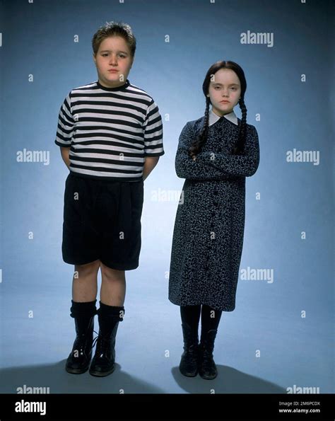 CHRISTINA RICCI and JIMMY WORKMAN in THE ADDAMS FAMILY (1991), directed ...