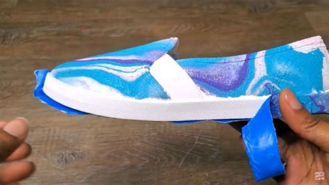 This tutorial is going to show you how to hydro dip shoes like a pro! These hydro dip shoes are ...