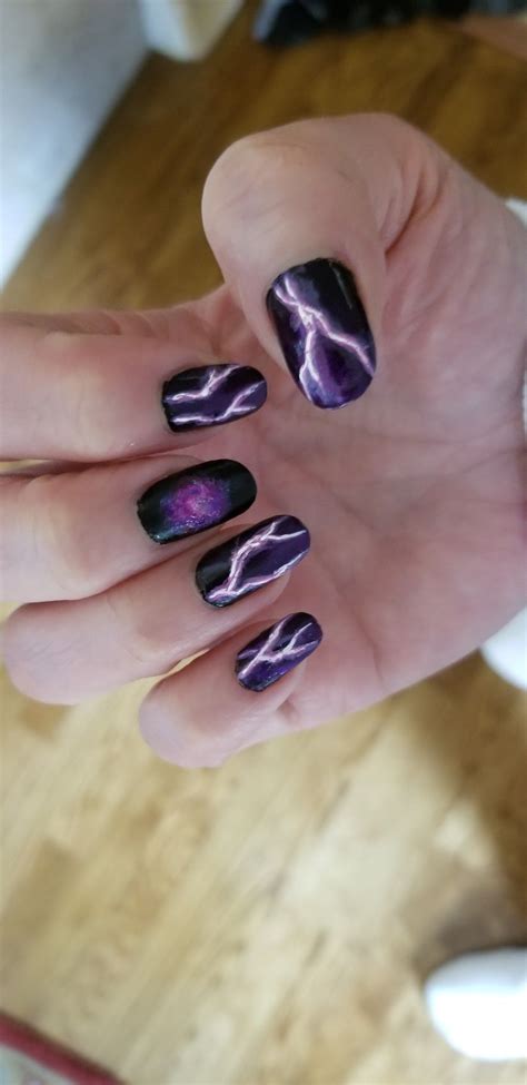 Photo of black and purple gradient nails with pinkish lightning ...