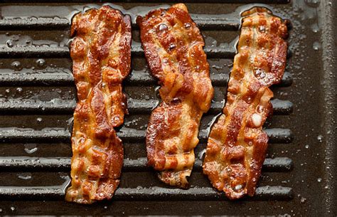 Royalty Free Sizzling Bacon Pictures, Images and Stock Photos - iStock