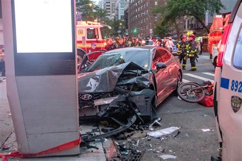 One dead, four injured in Manhattan car crash: sources