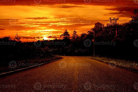 Road sunset scene landscape. 12232535 Stock Photo at Vecteezy