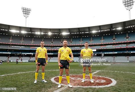 AFL Field Umpire Paul Rebeschini, AFL Field Umpire Brett Rosebury and ...