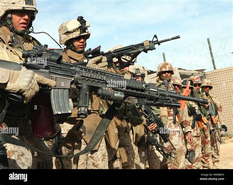 Iraqi Army soldiers and Marines from Company A, 1st Battalion, 7th ...