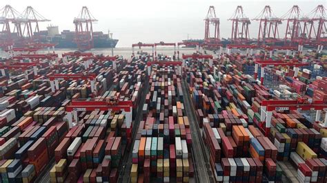 China tops world in port cargo, container throughput - CGTN