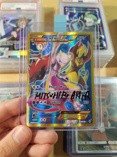 Just got this Mewtwo EX full art signed by the artist, Mitsuhiro Arita ...