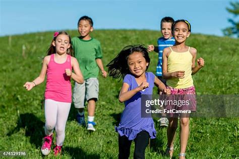 1,030 Kids Playing Tag Stock Photos, High-Res Pictures, and Images ...