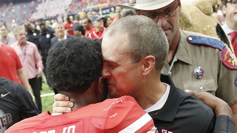 Let’s celebrate the college football coach who kisses his players ...