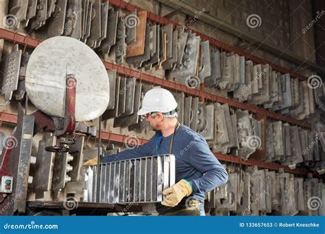 Worker at foundry factory stock image. Image of operation - 133657653