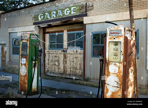 Old abandoned gas station with gas pump out front Stock Photo - Alamy