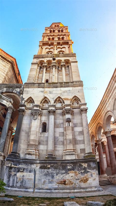 an old building with columns and arches in the background - stock photo ...