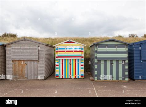 wooden beach huts in Minnis Bay, near Birchington, Kent Stock Photo - Alamy