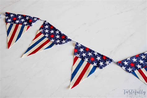 DIY Fabric Pennant Banner - Tastefully Frugal