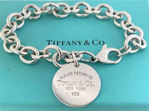 Authentic Tiffany & Co Silver Circle Tag Charm Bracelet | Etsy in 2020 | Tiffany and co bracelet ...