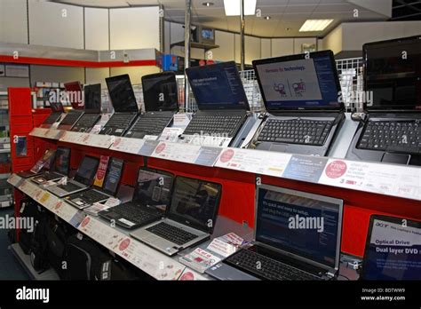 Laptop computers on sale in a store Stock Photo - Alamy