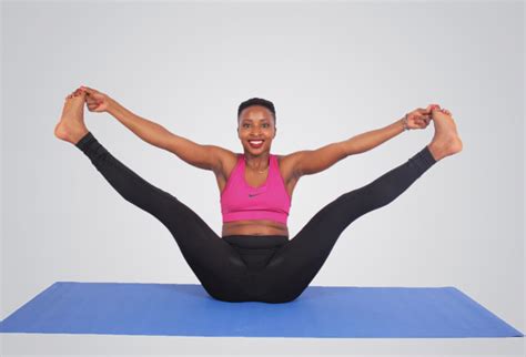 Flexible Woman Doing Yoga Pose. Side Split Touching Toes