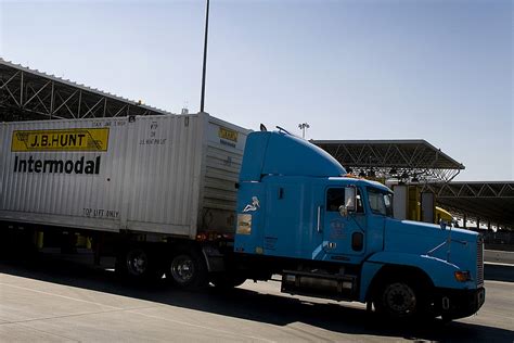 J.B. Hunt Profit Tops Expectations Despite Clogged West Coast Ports - WSJ